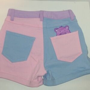 DOLLS kill care bears peekaboo block colored shorts size extra small